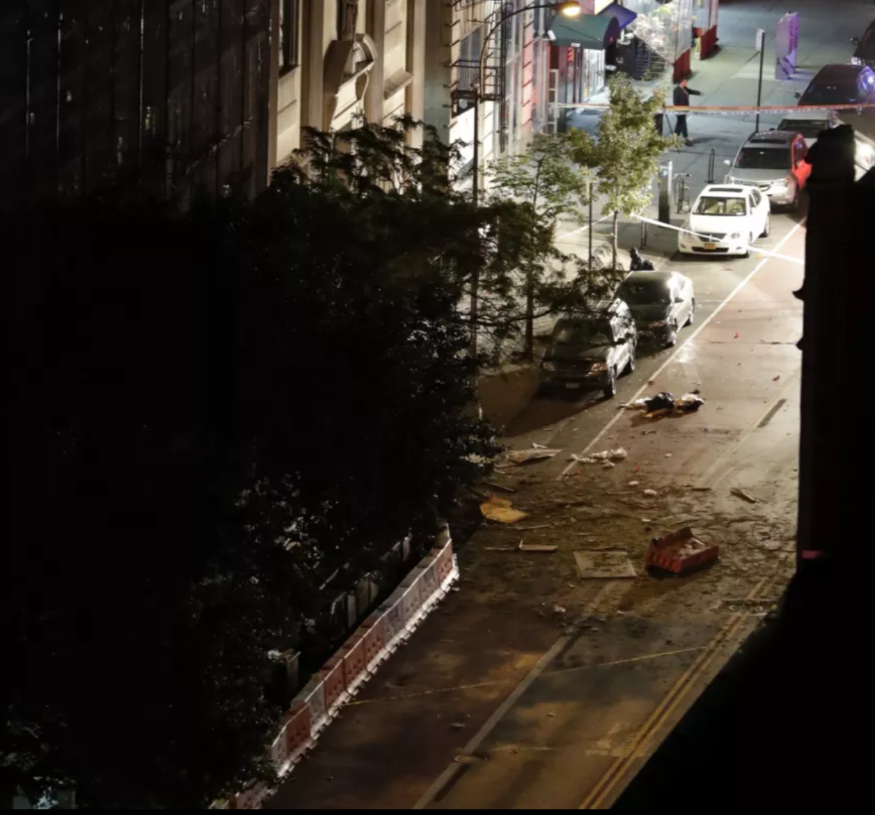 Debris is seen in the street in front of St. Vincent de Paul church where an explosion occurred on 23rd street between 6th and 7th Avenue in the borough of Manhattan in New York, USA, on September 17, 2016. (Jason/Szenes/EPA)