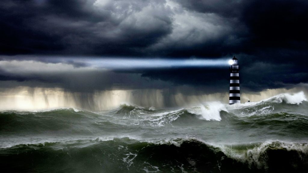 Lighthouse in Storm Image by John Lund/Corbis